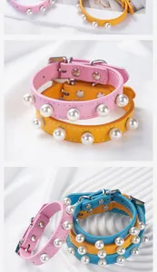 Close-up of colorful PU leather pet collars featuring elegant pearl stud details