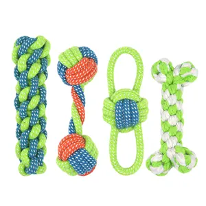 Four-piece durable cotton rope dog chew toy set in vibrant colors for teeth cleaning
