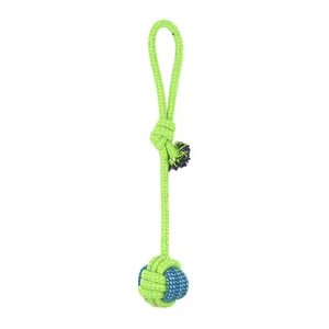 Durable braided cotton rope dog toy featuring a pull loop and chew ball in lime green