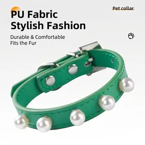 Green PU leather pet collar decorated with elegant white pearls and silver hardware.