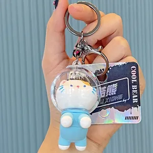Cute space series cat PVC keychain pendant with a clear helmet and blue suit