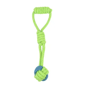 Detail view of durable braided cotton rope dog toy in lime green and blue