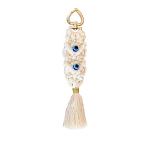 Handmade Bohemian macrame keychain with evil eye beads and heart clip