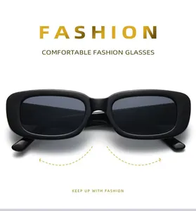 Macro view showing the sleek black frame and lenses of retro small rectangle sunglasses.