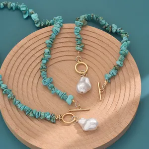 Elegant turquoise stone necklace and bracelet set with gold OT clasp and baroque pearl.