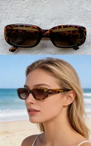 Close-up of vintage leopard print sunglasses with tea lenses on beach model