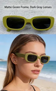 Detail showing sand green rectangular sunglasses on a wall and worn by a model at beach.