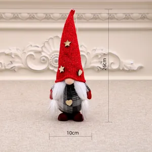 Detailed view of a red knitted Christmas gnome ornament showing 26cm height and 10cm width