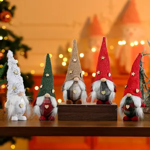 Set of five handmade Christmas gnome dolls with pointed hats and plush beards