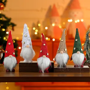 Set of five colorful faceless Christmas gnomes for festive tree hanging decorations.