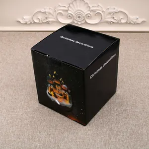Detailed view of the black gift box for the Christmas glowing music box resin ornament