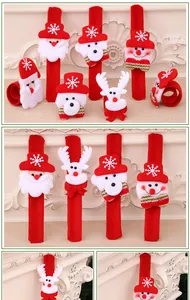 Detail view of plush Christmas snap bracelets featuring Santa, snowman, and reindeer.