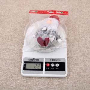 Close-up detail showing the 23g weight of a Christmas gnome plush tree ornament