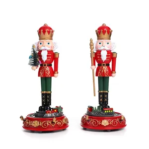 Musical rotating nutcracker soldier ornament with Christmas tree and scepter detail