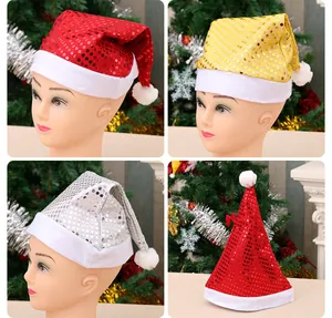 Detail view of sequined Christmas hats in red, gold, and silver