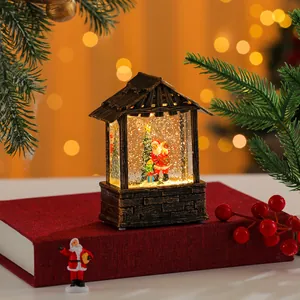 Detailed view of the glowing Christmas snow globe lantern with swirling glitter