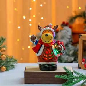 Detail einer leuchtenden Weihnachts-Rentierfigur aus Harz mit Musikfunktion