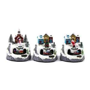 Set of 3 Christmas musical boxes featuring rotating trains and glowing snowy village houses