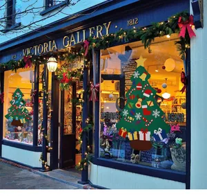 DIY felt Christmas tree kit displayed as a festive decoration in a shop window