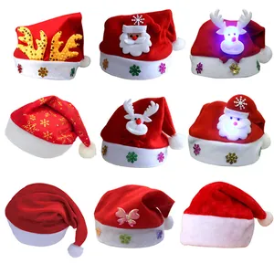 Collection of festive red plush Santa hats for adults and kids featuring LED lights