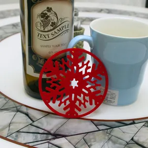 Detailed view of a red snowflake felt coaster in a festive Christmas setting.