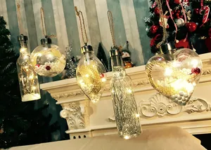 Warm LED lighted Christmas ornaments in various shapes hanging by a festive fireplace