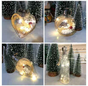 Detailed view of various shaped glowing Christmas balls with internal LED fairy lights.