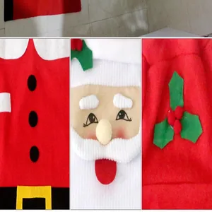Macro details of festive red Santa Claus themed bathroom toilet seat cover set decorations