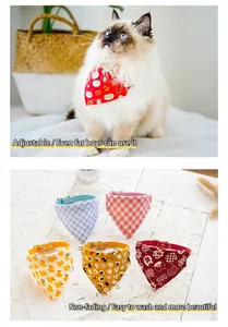 Close-up of various cute patterns for pet bandana collars including duck and floral