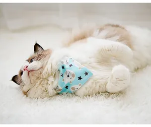 Detailed view of a cute light blue pet bandana featuring polar bear and star patterns