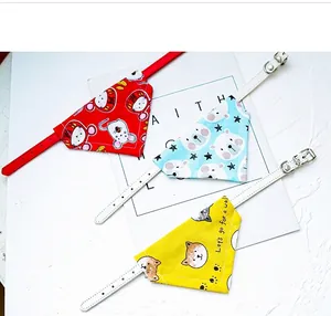Detailed view of cute pet bandana collars with colorful cartoon animal prints for cats and dogs