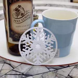 Elegant white felt snowflake coaster for Christmas holiday home tabletop decoration accessory