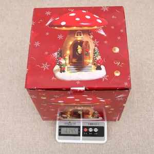 Measurement of the Christmas mushroom music box in its decorative gift packaging