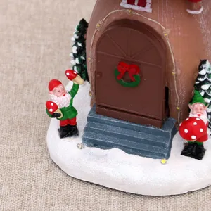 Detailed macro view of a Christmas resin music box with gnomes and snow base decor