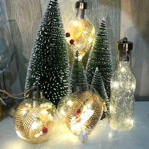 Elegant warm glowing clear plastic Christmas ornaments set with internal LED lights and berries