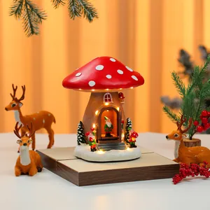 Detailed view of a glowing Christmas mushroom house music box with cute gnomes and warm lights