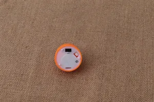 Bottom detail of Halloween LED candle light showing switch and battery compartment