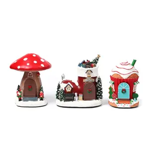 Whimsical Christmas resin music boxes featuring mushroom, boot, and cupcake houses