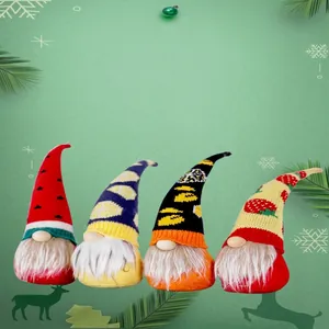 Lot de quatre gnomes de Noël festifs avec bonnets à motifs de fruits pour décoration