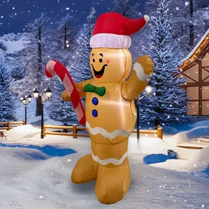 Vibrant inflatable gingerbread man with LED lighting displayed in a scenic winter wonderland