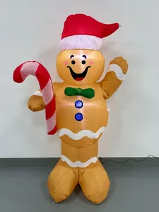 Large inflatable gingerbread man with Santa hat and candy cane for Christmas decor