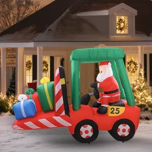 Inflatable Santa driving a red forklift with gifts, outdoor Christmas yard decoration