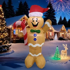 Giant inflatable gingerbread man with LED lights and Santa hat for Christmas yard decor