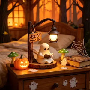 Veilleuse décorative d'Halloween en résine lisant sous un lampadaire vintage chaleureux