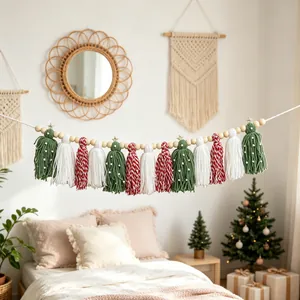 Handmade boho Christmas tassel garland banner with wooden beads hanging in a bedroom