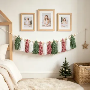 Handmade Bohemian Christmas tassel banner with wooden beads hung in a cozy bedroom