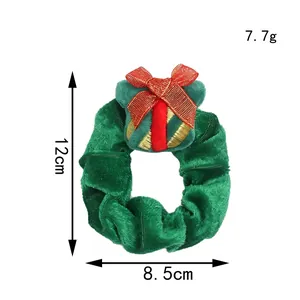 Afmetingen en gewicht van de groene kerst scrunchie van fluweel met strik