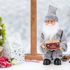 Detail showing a standing Santa Claus doll in grey plush suit for window decoration