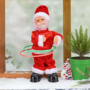 Detailed view of an electric Santa Claus figurine with hula hoops on a snowy sill