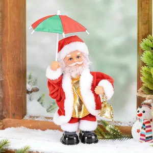 Detail of electric Santa Claus figure holding a red-green umbrella and golden bell.